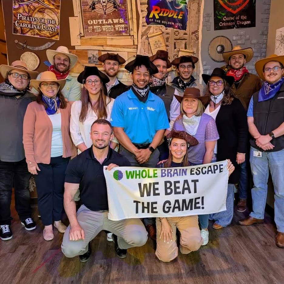 Team building event participants at Whole Brain Escape in Apex.